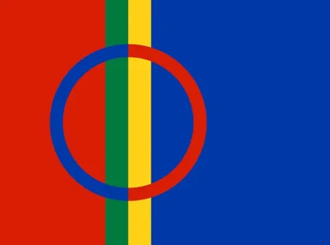 en röd, blå, gul och grönrandig flagga